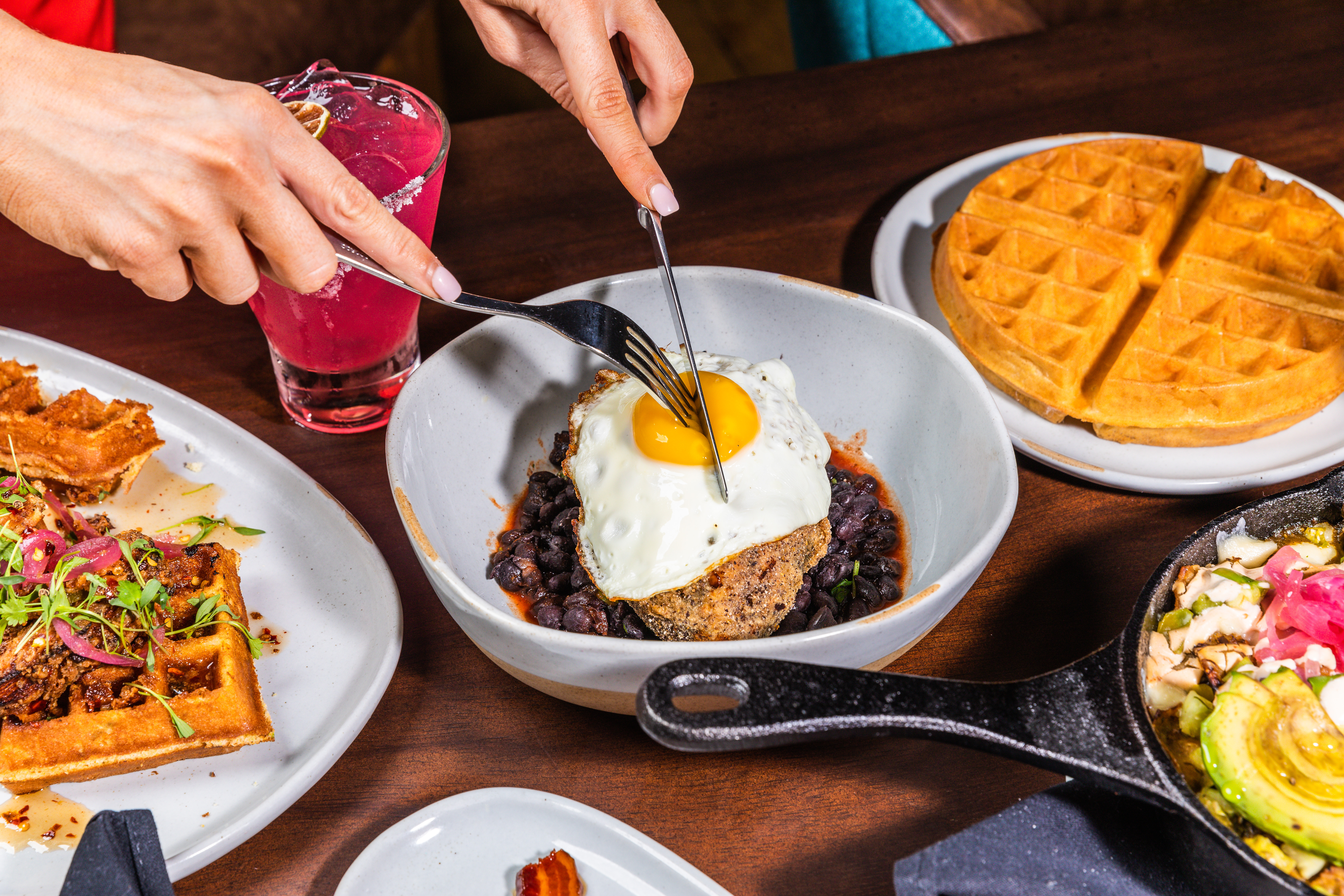 Corn_Bread_Chicken_Waffles,_The_Famous_Prickly_Pear_Margarita,_Steaks_Eggs_Entree,_Waffle,_Chilaquiles_Skillet_Canyon.jpg
