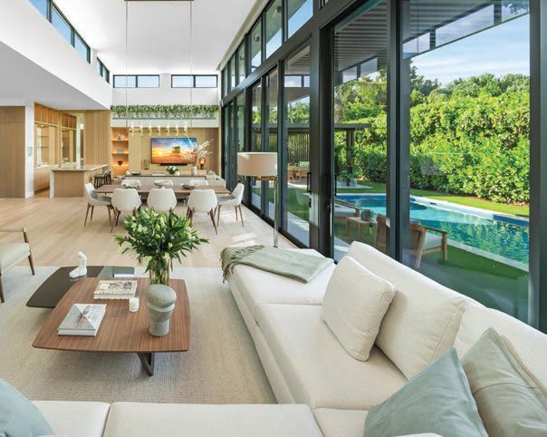 The living area
leads to the backyard in a
chic, breathy design PHOTO COURTESY OF LUXE LIVING REALTY