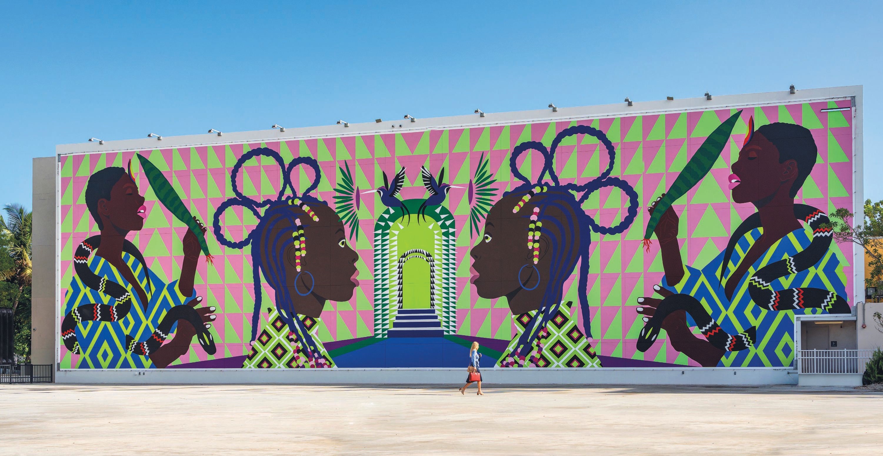 Criola’s striking and colorful “Interdimensional Portal” mural is now on view in the Miami Design District’s Jungle Plaza. PHOTO BY LUIS GOMEZ
