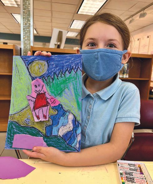 Memory Landscapes, Real and Imagined; a student at the Shenandoah library sharing her drawing PHOTO COURTESY OF: PROJECTART MIAMI