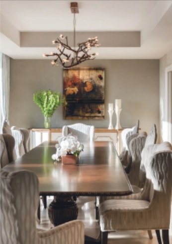 A chandelier by Allan Knight lights the dining room. PHOTOGRAPHED BY VENJHAMIN REYES